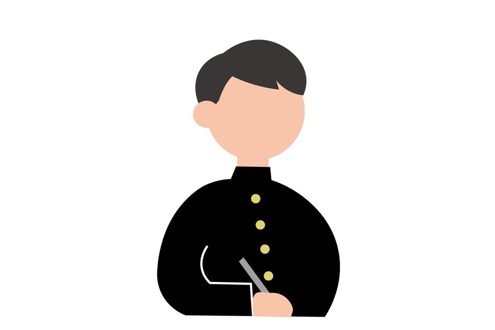 学ランを着た男子高校生が勉強をしている様子
